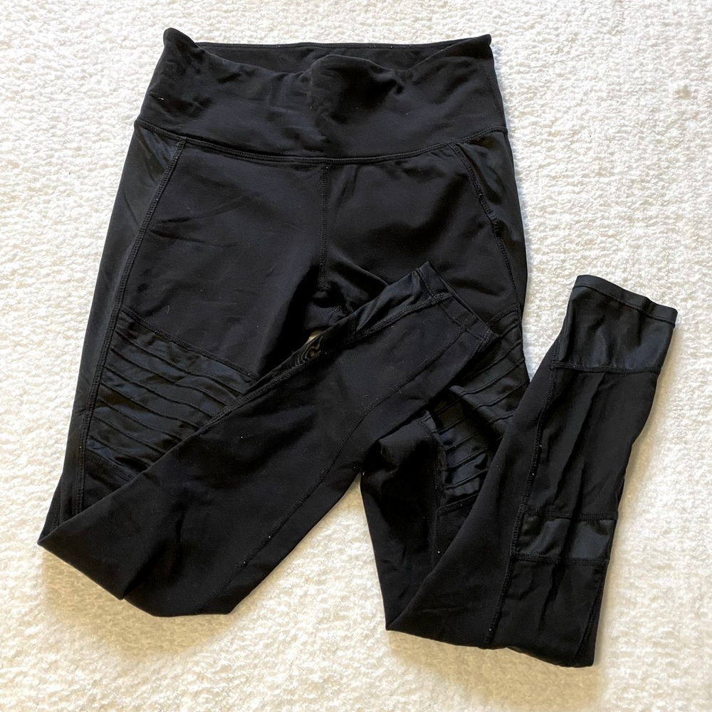 Women’s Athleta moto leggings. Size S. Good condition with some pilling.